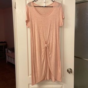 Soft peach long shirt. Great for over leggings or skirt. Thin material.